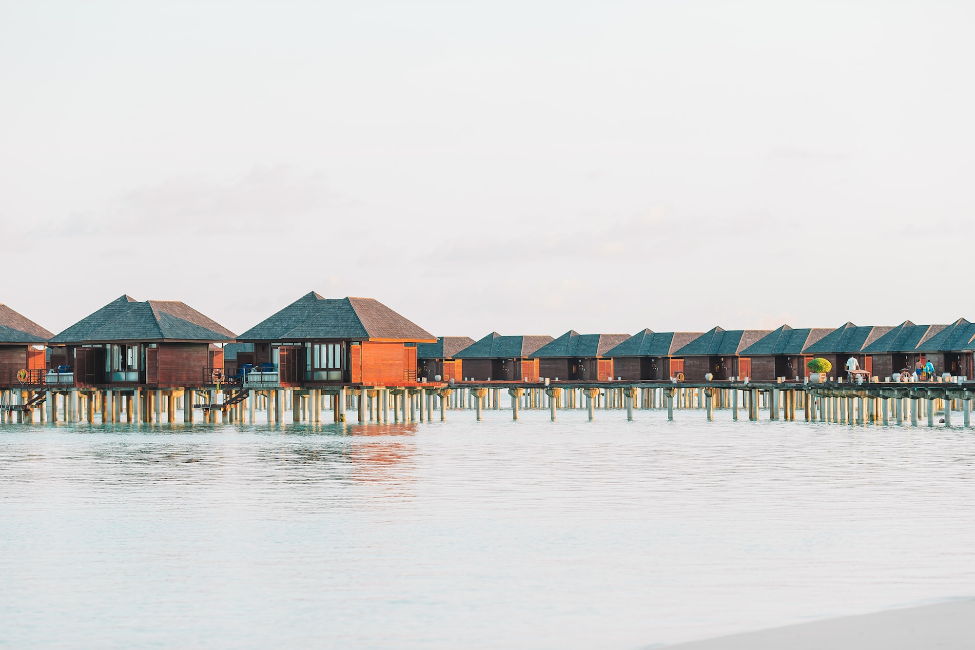 Water bungalows with turquiose water on Maldives
